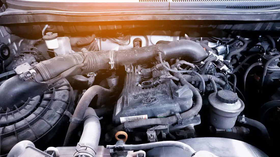 Various components of an automative engine displayed against a clean background.